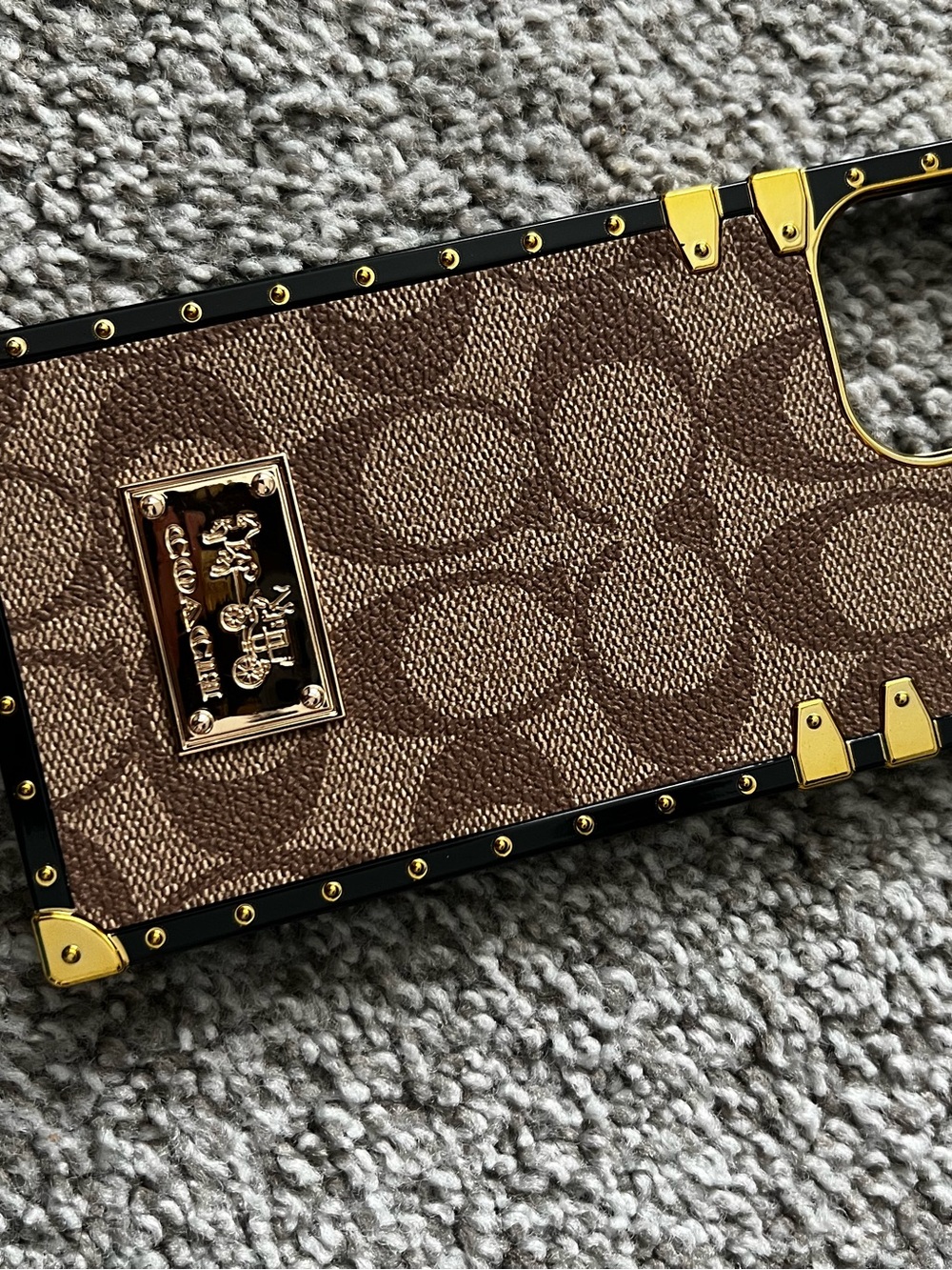 Coach Brown Signature Canvas Trunk Phone Case with Gold Hardware